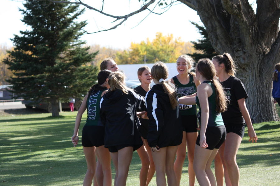 Cross Country girls celebrating after a race during 2022 Cross Country Divisionals.