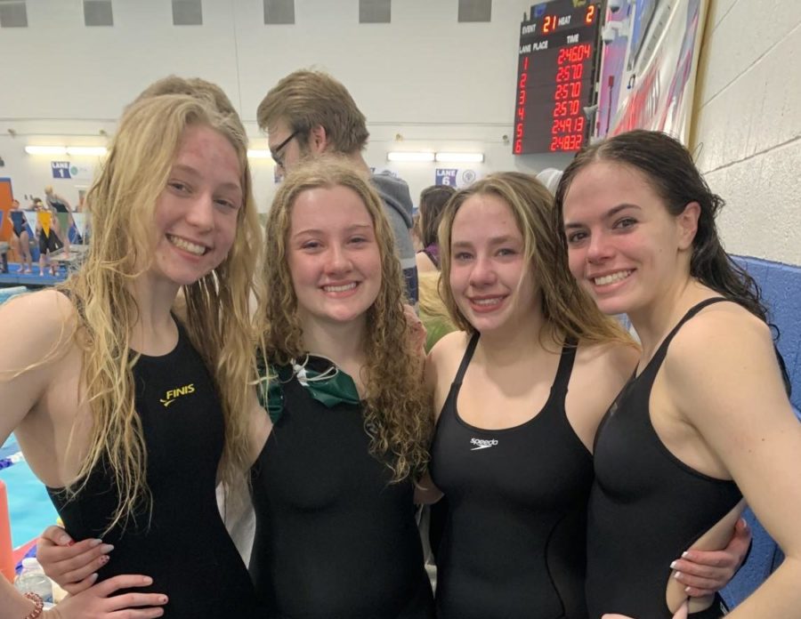 Senior Girls (Alyson Early, Abigail Davison, Ellie Smith, Megan Beers) after their swim