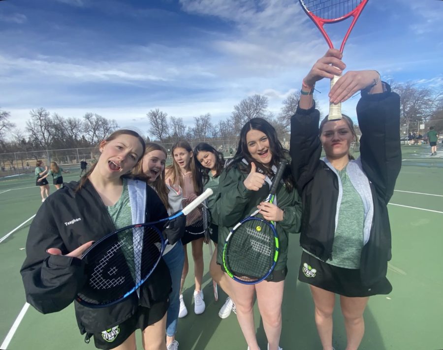 BCCHS Girl's Tennis team posing for a picture at Pioneer Park.