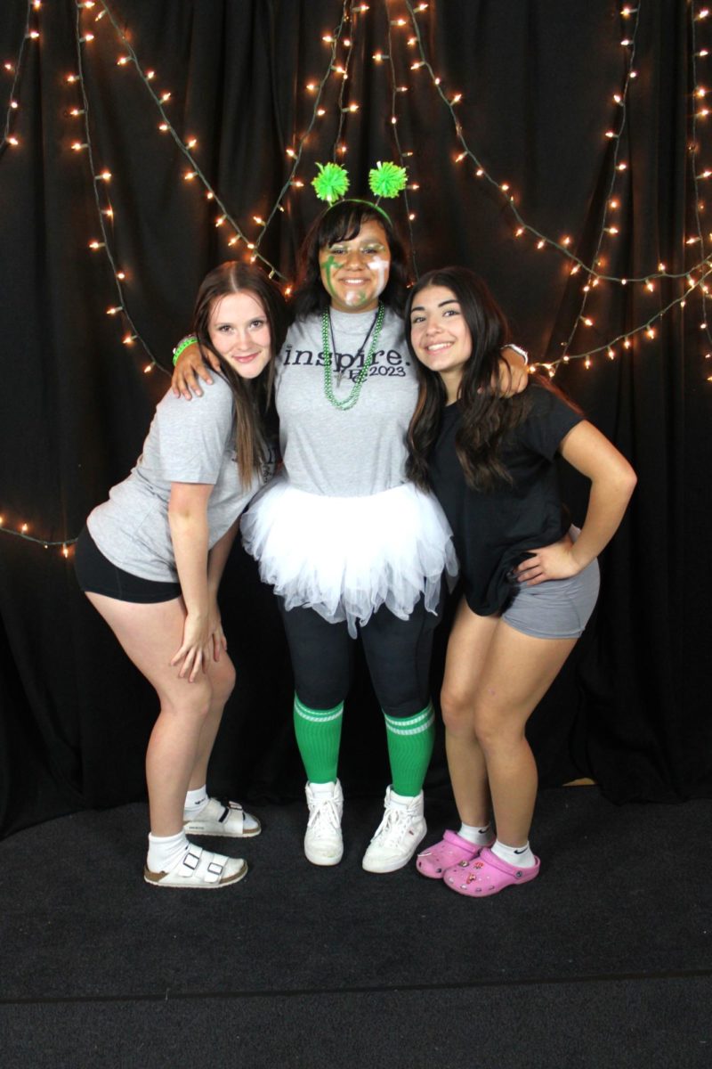 A group of Freshman girls pose for a picture at the homecoming dance