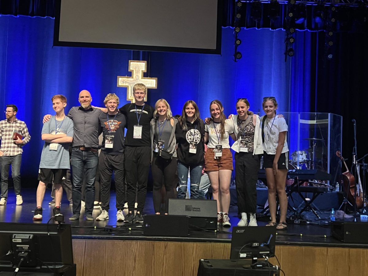 Students on stage with leading musician Ben Walther 