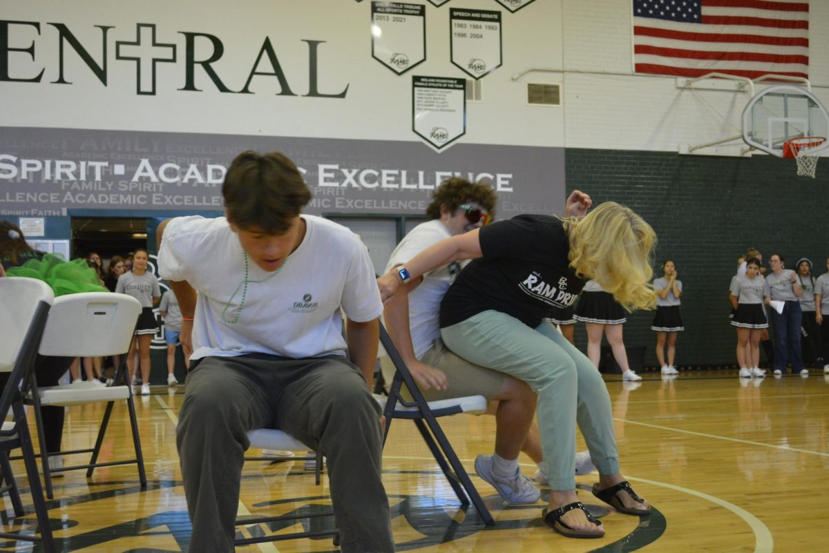 Mrs Sogaard losing to Jordan Harrell in musical chairs.