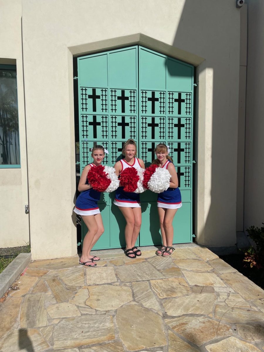 12.7.2023 Isabelle Desmarais, Kayden Soucy and Cyann Crabtree(left to right) in front of the Damien and Marianne of Moloka’i Education Center.