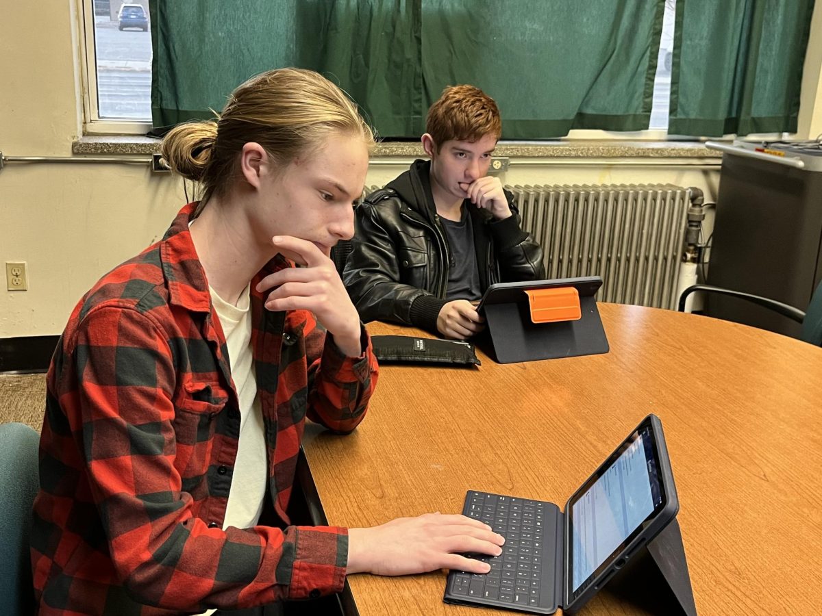 10th graders Baxter Jensen (left) and Noah Duncil (right) use the library to study for classes. 