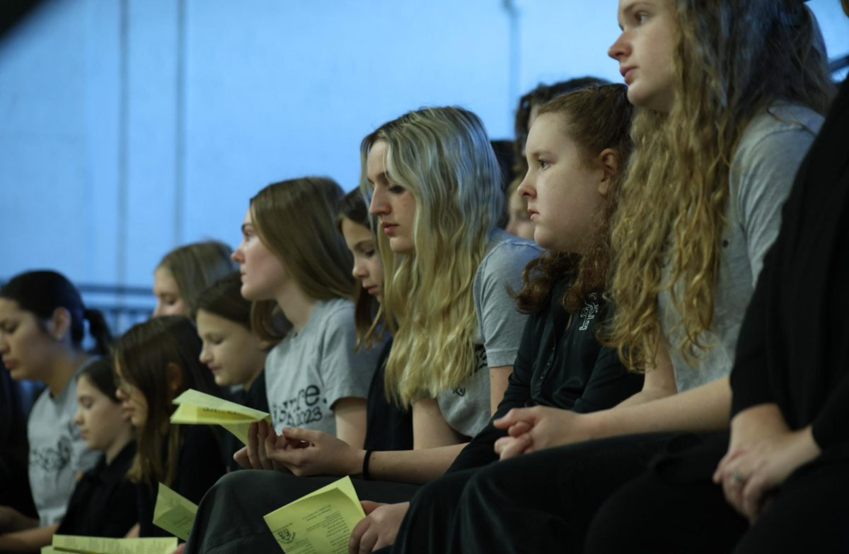  Several KCK buddies sit next to each other while they pay attention to the mass on Nov. 21, 2023.