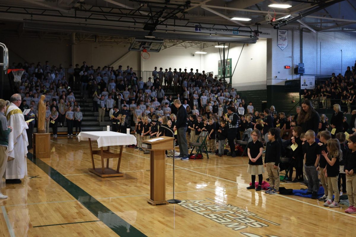 11.21.2023 Billings Catholic Schools students shown gathering to celebrate Mass.