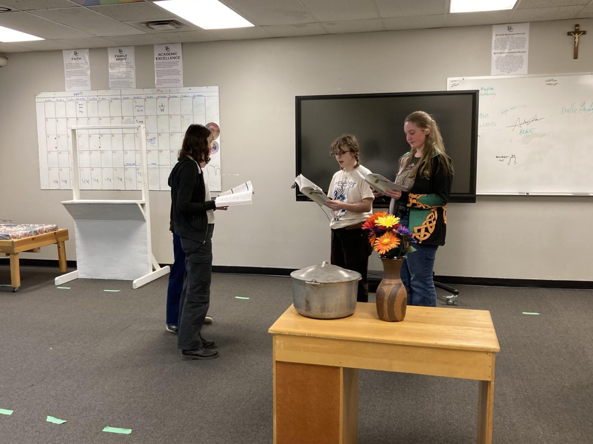 1.30.24 Sophie Hall, Olivia Guenther, Julia Reger-Brown, and Halle Anderson memorizing lines.