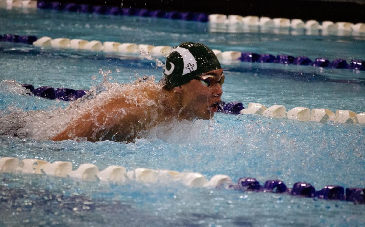 2.9.24 
Junior Daniel Apostol swims the boys 100 butterfly at Great Falls during the state swim meet. 