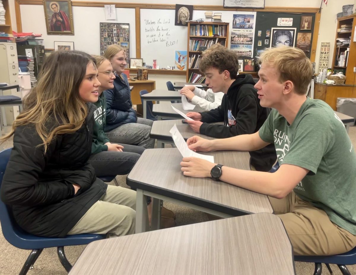 2/14/2024 
Seniors, Kenna and Aidan in Father John’s “Speed Dating”  seminar. 