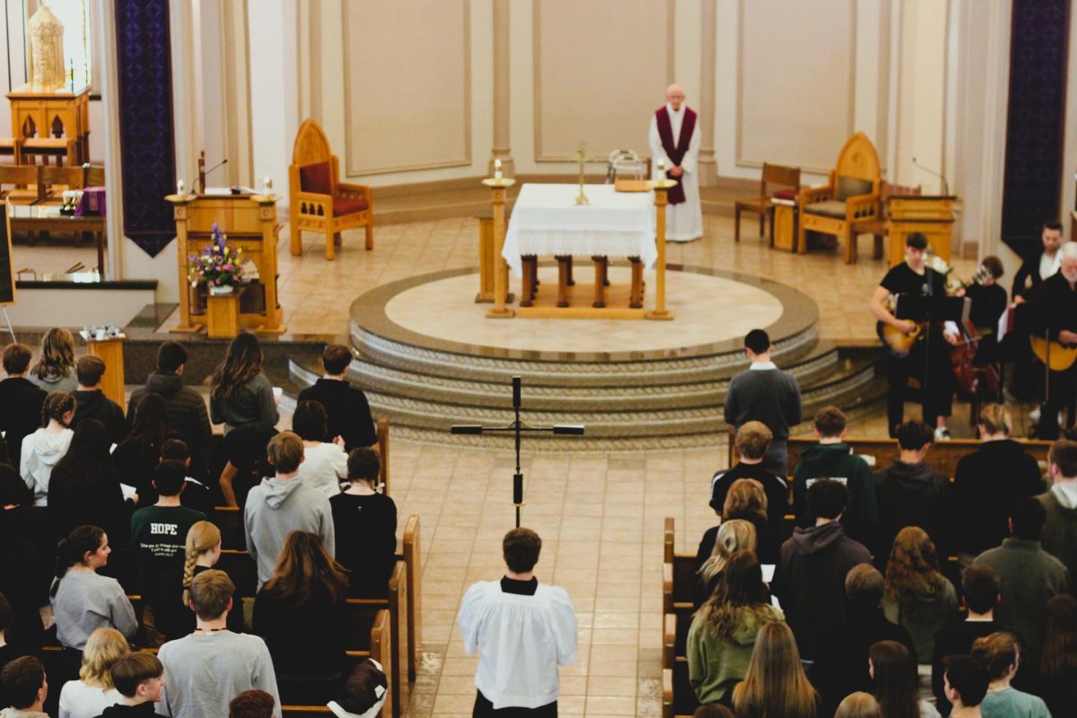 cross getting taken into the church