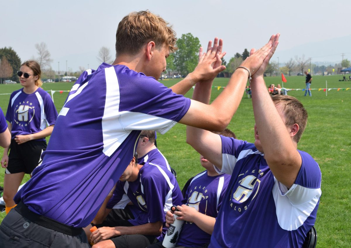 Special Olympics athletes celebrating. Courtesy Photo.