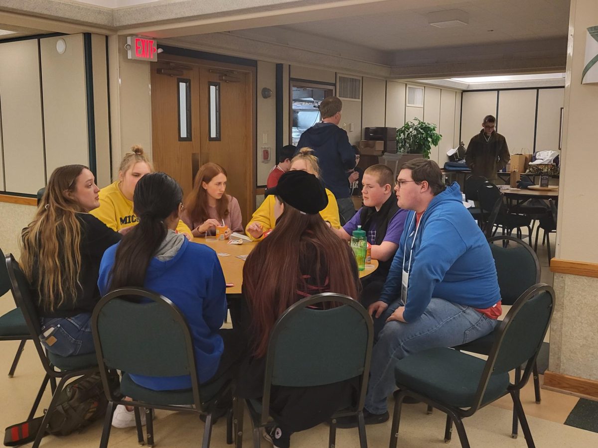 3.16.24. The youth group of St. Bernard’s Catholic Church in Billings enjoys snack time to discuss their experiences at the talks. 