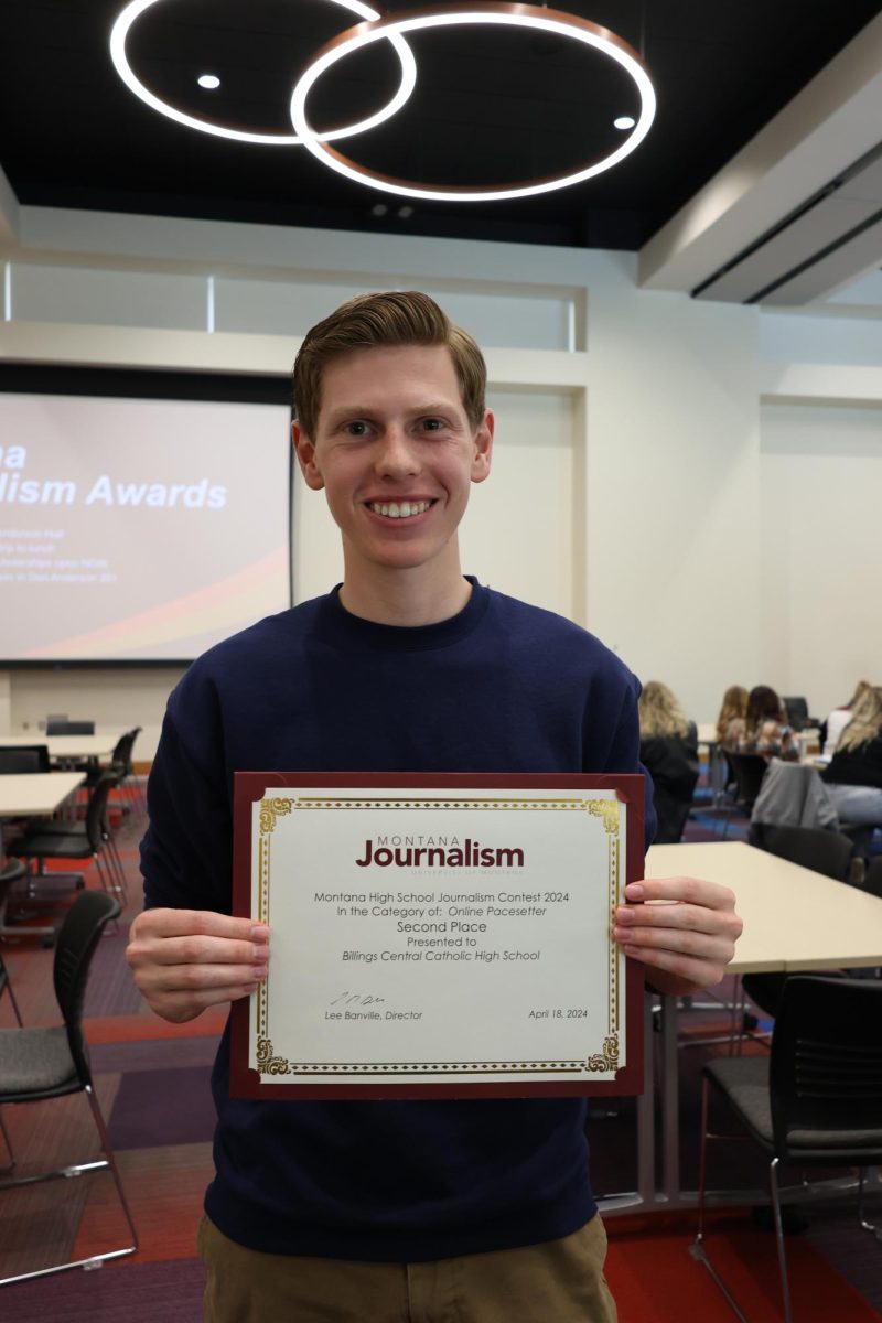 4/18/24 Senior Hank Jagodzinski accepting the second place “Online Pacesetter” award. 