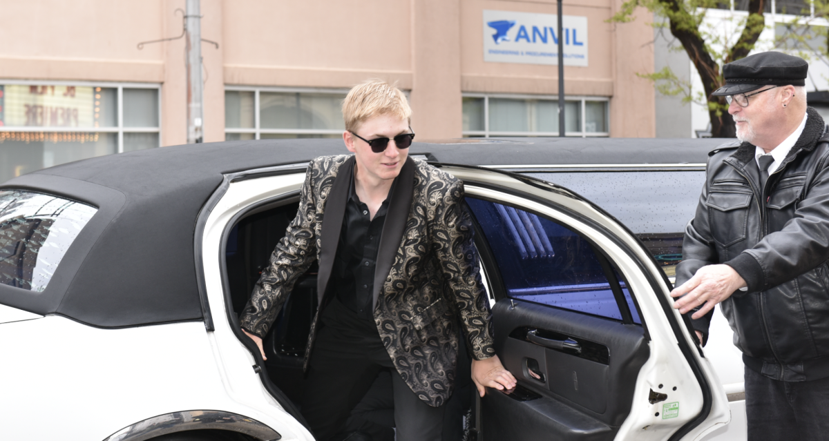 5.8.24 Senior David Ramshaw steps out of the limo at the film premiere. 