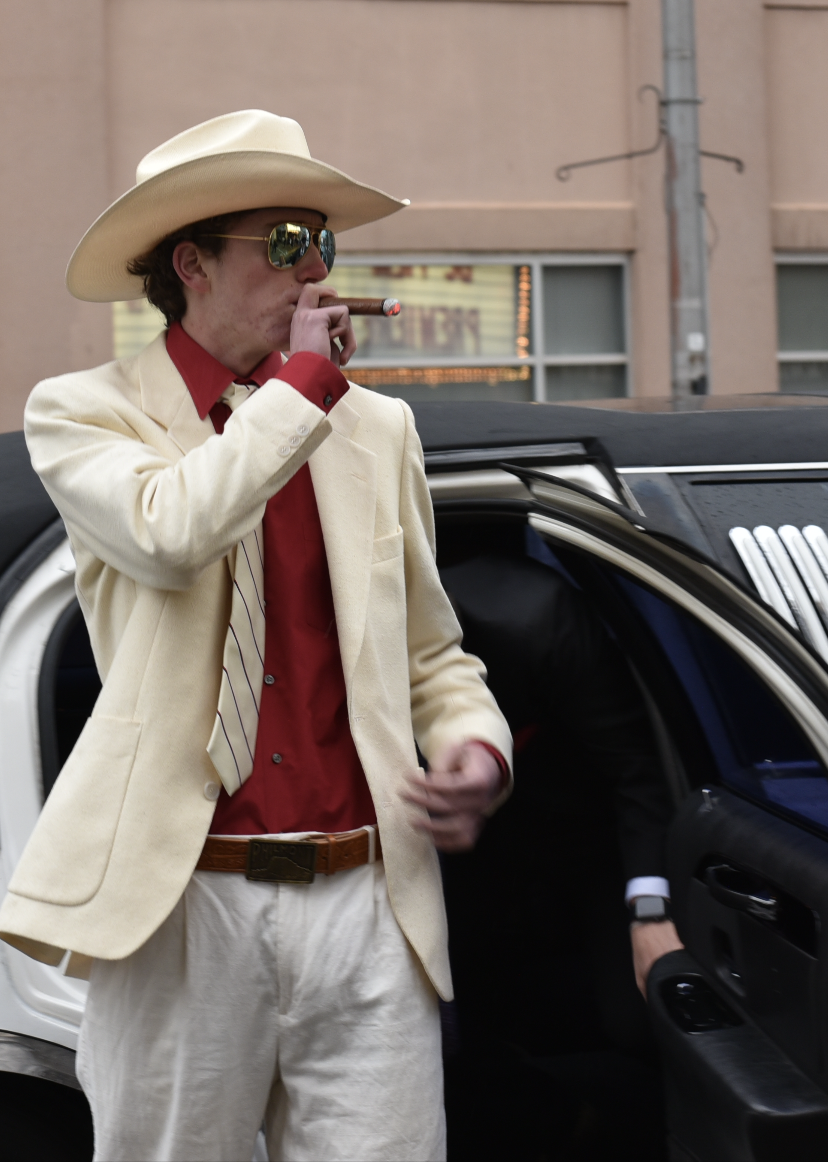 5.8.24 Senior John Pender steps out of the limo holding a fake cigar.