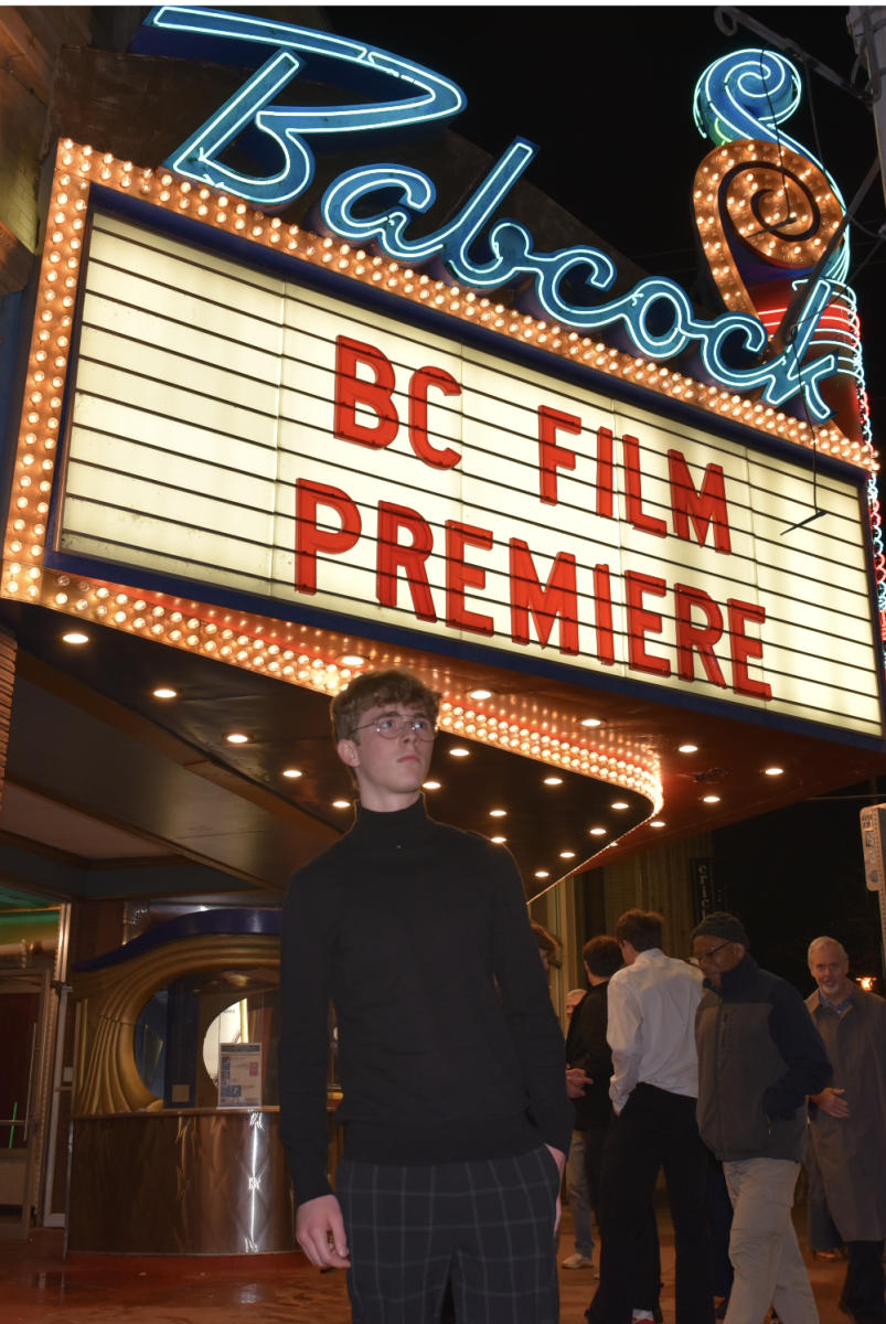 5.8.24 Freshman Micah Fink stands in front of the BC Film Premiere sign after watching the films. 