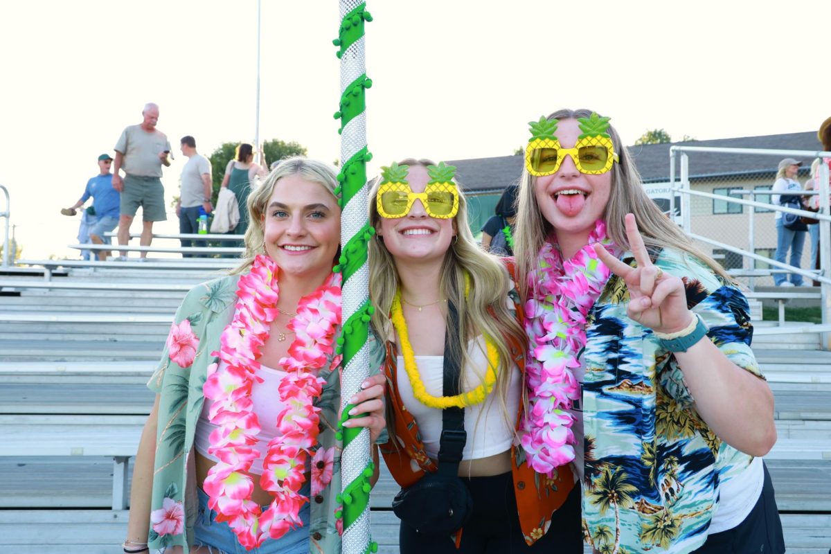 8.30.24 (From L to R) Seniors Courtney Hofer, Emirie Hastings, and Junior Sam Winchell at Friday night’s game. 