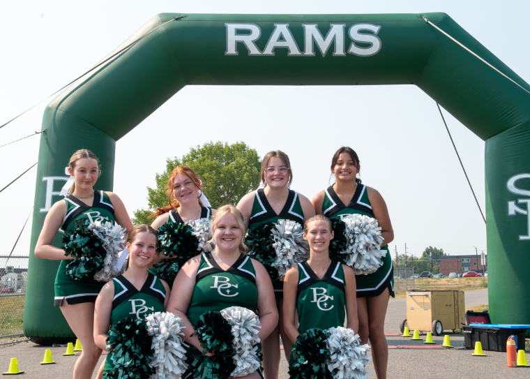 9.8.24 Cheerleaders at on Sunday at Running on Faith after cheering on the runners at the start of the race. 