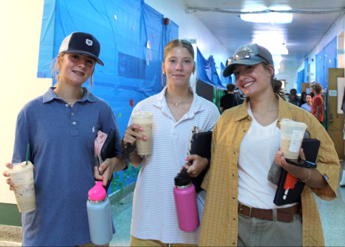 9.10.24 (From L to R) Freshmen Maggie Baker, Beth Baker, and Emerson Dull on BBQ dads vs. Soccer Moms Day. 