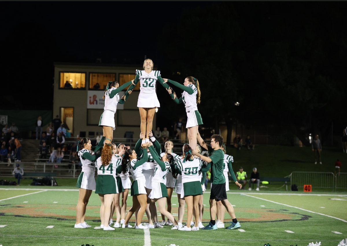 9.13.24 Billings Central cheer does a stunt during halftime. 