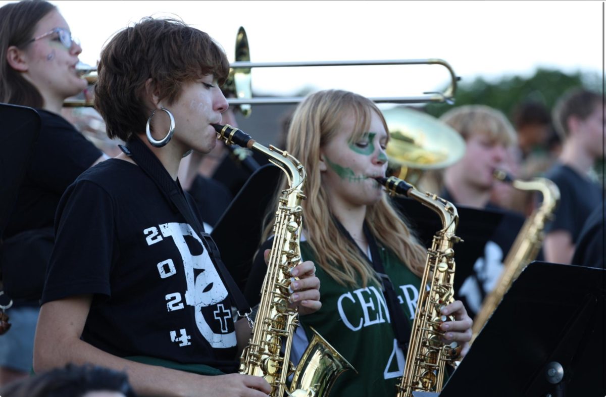 9.13.24 (From L to R) Juniors Kylie Poling and Cyann Crabtree playing the saxophone for pep band. 