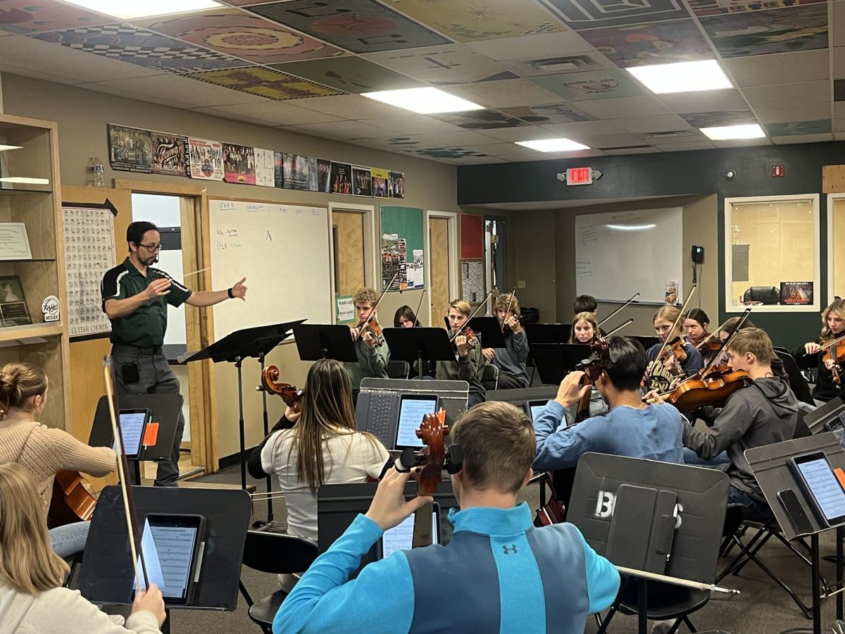 11.25.24
Mr. Martinez, Central’s head of the music department, leading practice for the upcoming Cantata concert.  