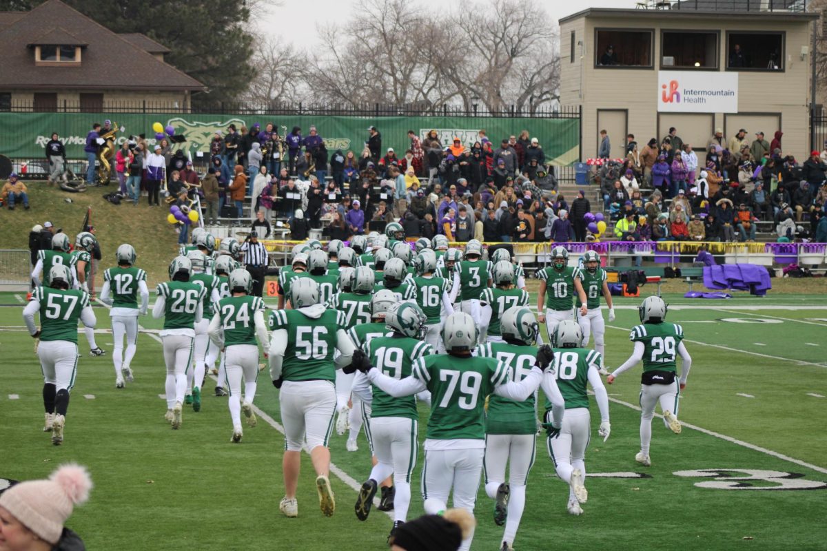 11.23.24
Central Rams football team charge the field to start the game.