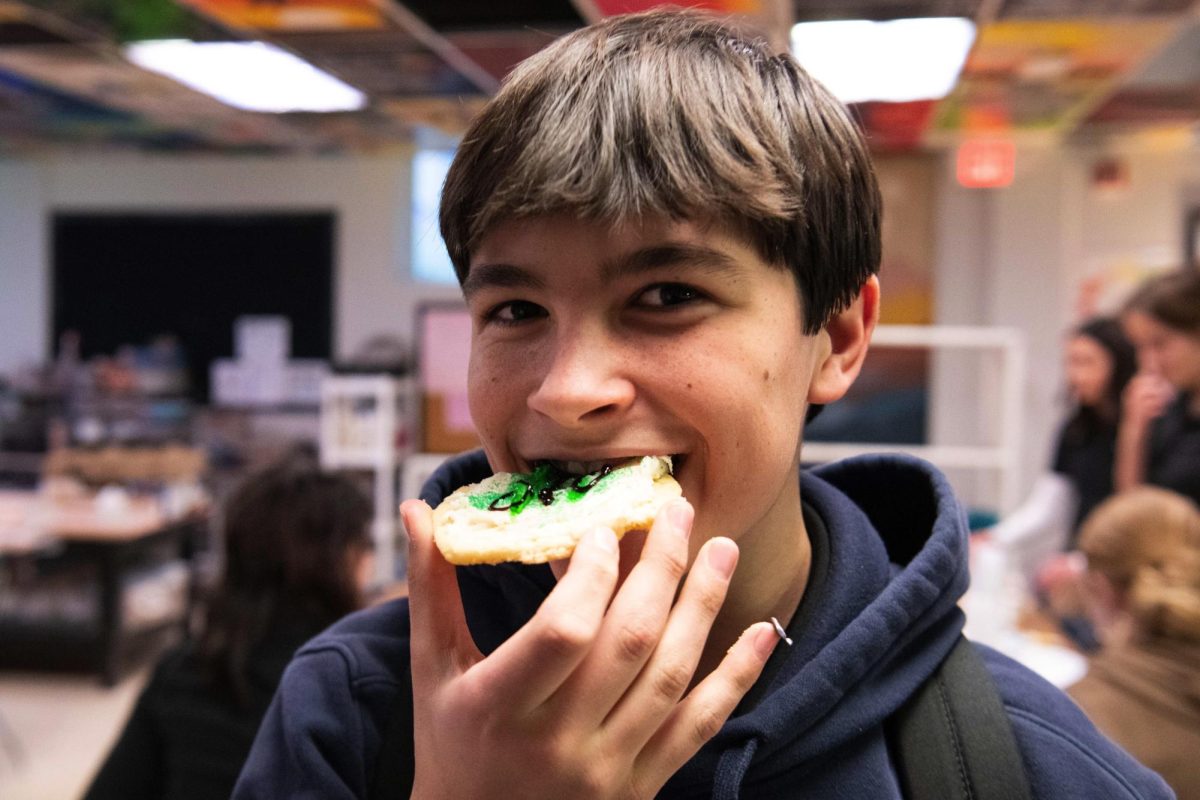 12.18.24 
Preston Bernstein (9th) enjoys the fruits of his labor in Art Club