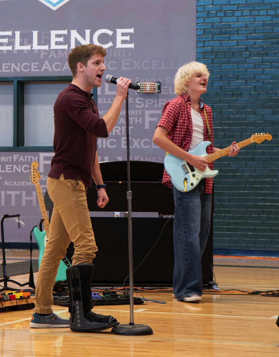 1.28.25
Left to right
Central teacher Nick Mack singing and Student Jacob Jewett playing guitar for talent show.