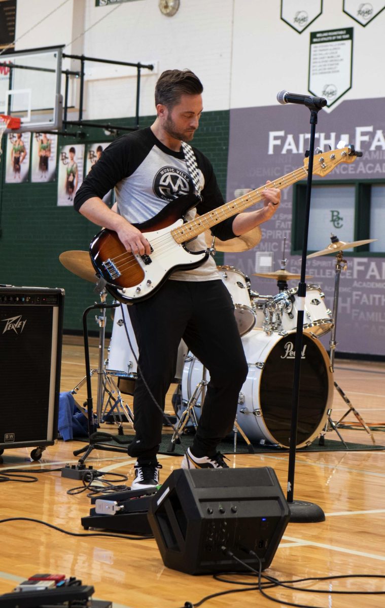 1.28.25
Teacher at Billings Central High School Mr. Shane Fairbanks playing bass in talent show.