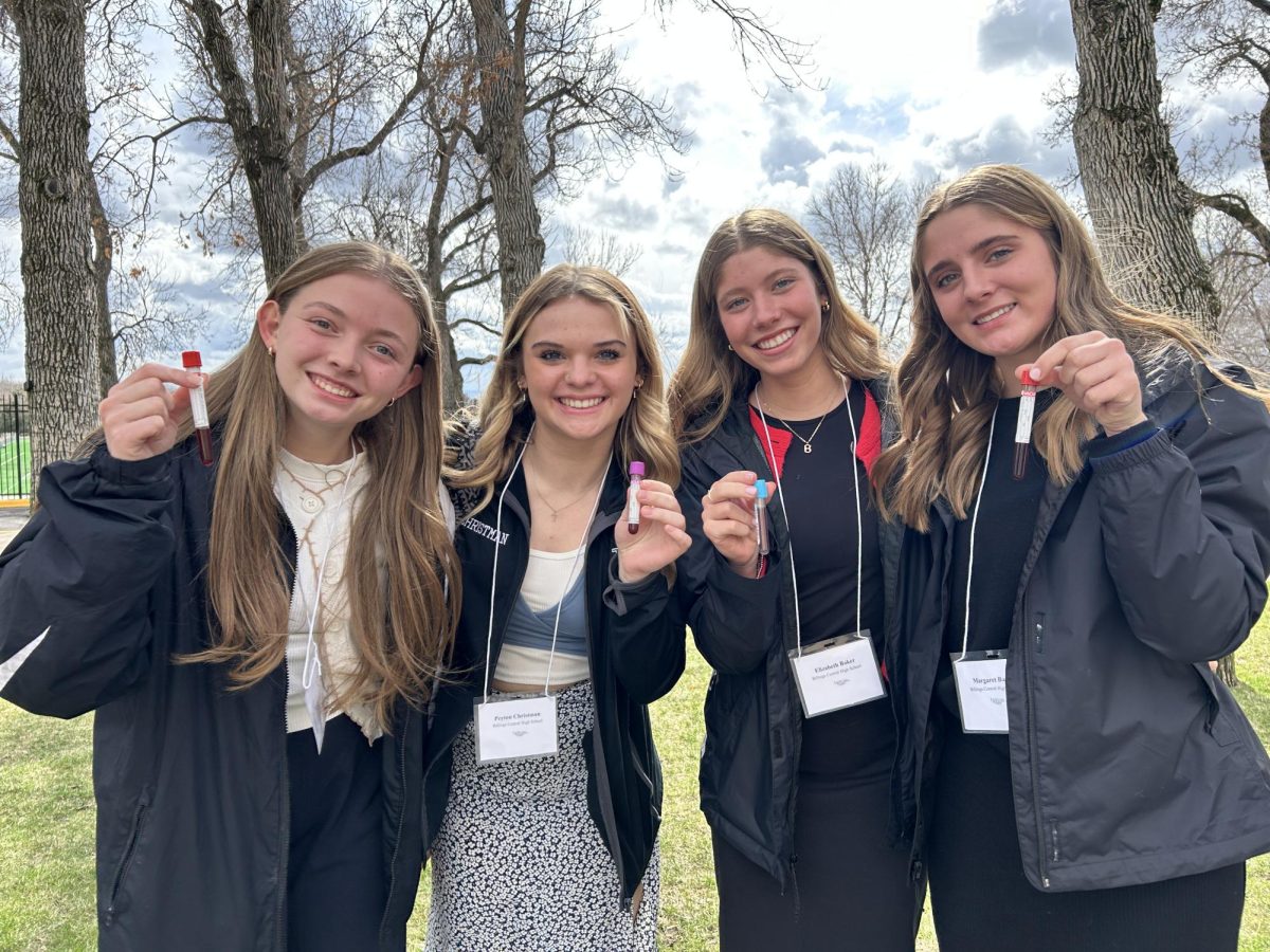 4.2.25 (From L to R) Junior Olivia Guenthner, Freshman Peyton Christman, Freshman Beth Baker, and Freshman Maggie Baker at Rocky Mountain College after completing one of the symposiums. 