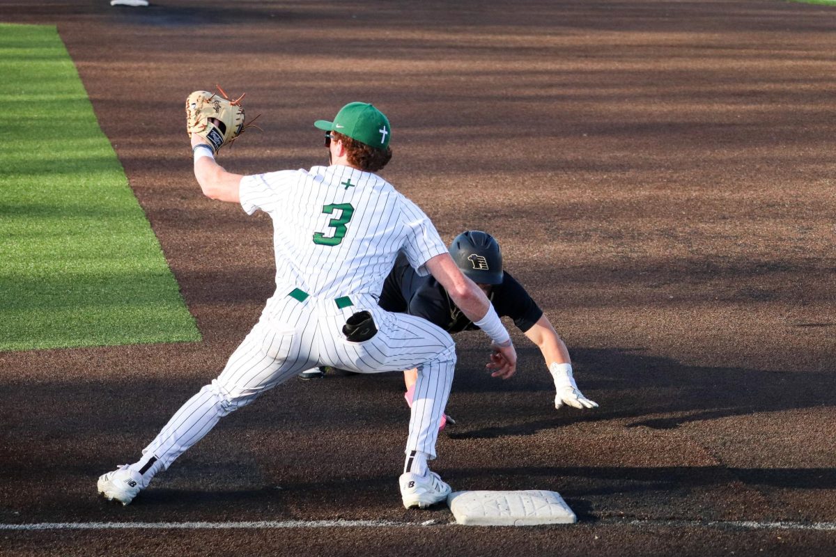 5.8.25 jr. Howie Martin trying to tag a West High player out.