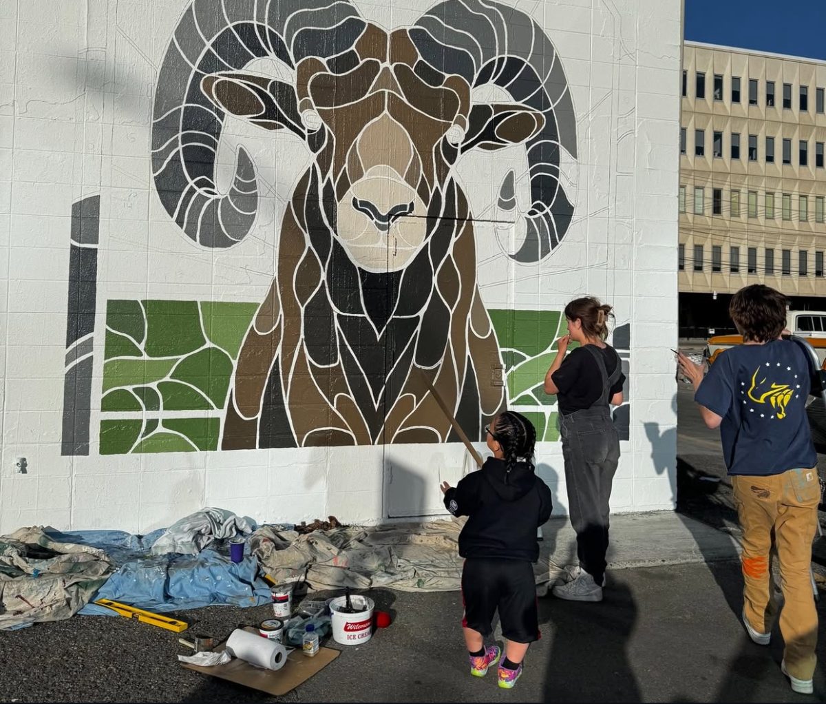 Billings Central students painting the Masterlube Mural.