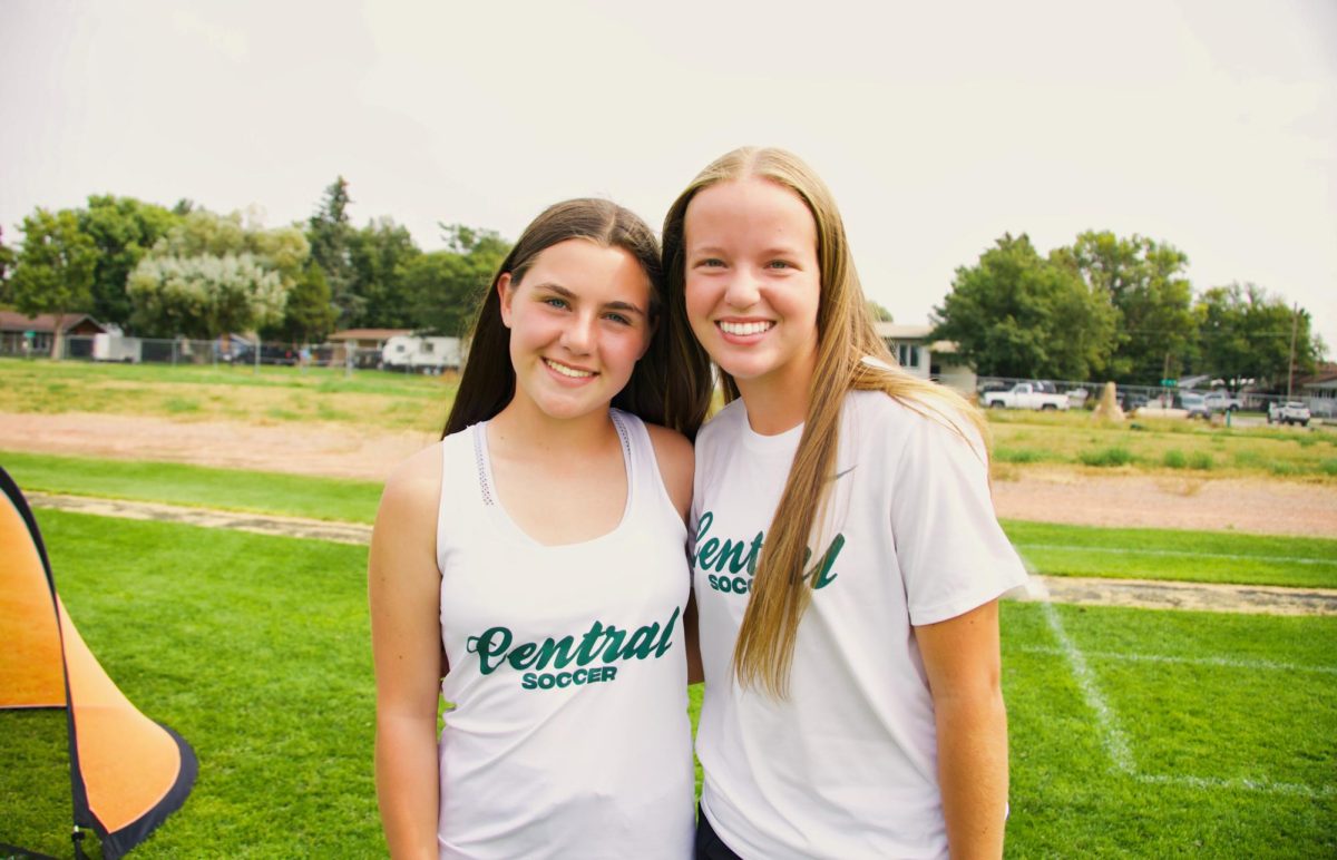 9.7.25
(From L to R) Freshmen, Brynn Lague and Haylie Swenson posing for a photo while preparing the Girl’s Soccer Team booth. 