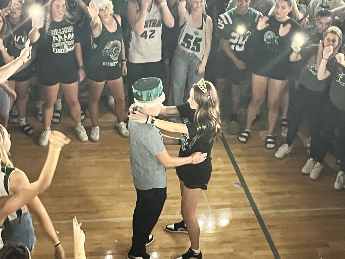 9.19.25
BCCHS Students surround pictured HOCO king and queen, Rocky Benson (senior), and Teagan Vaira (senior)
