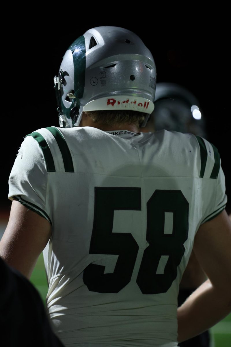 10.3.25
Senior Tyton Larsen watching the Rams defense from the sidelines. 