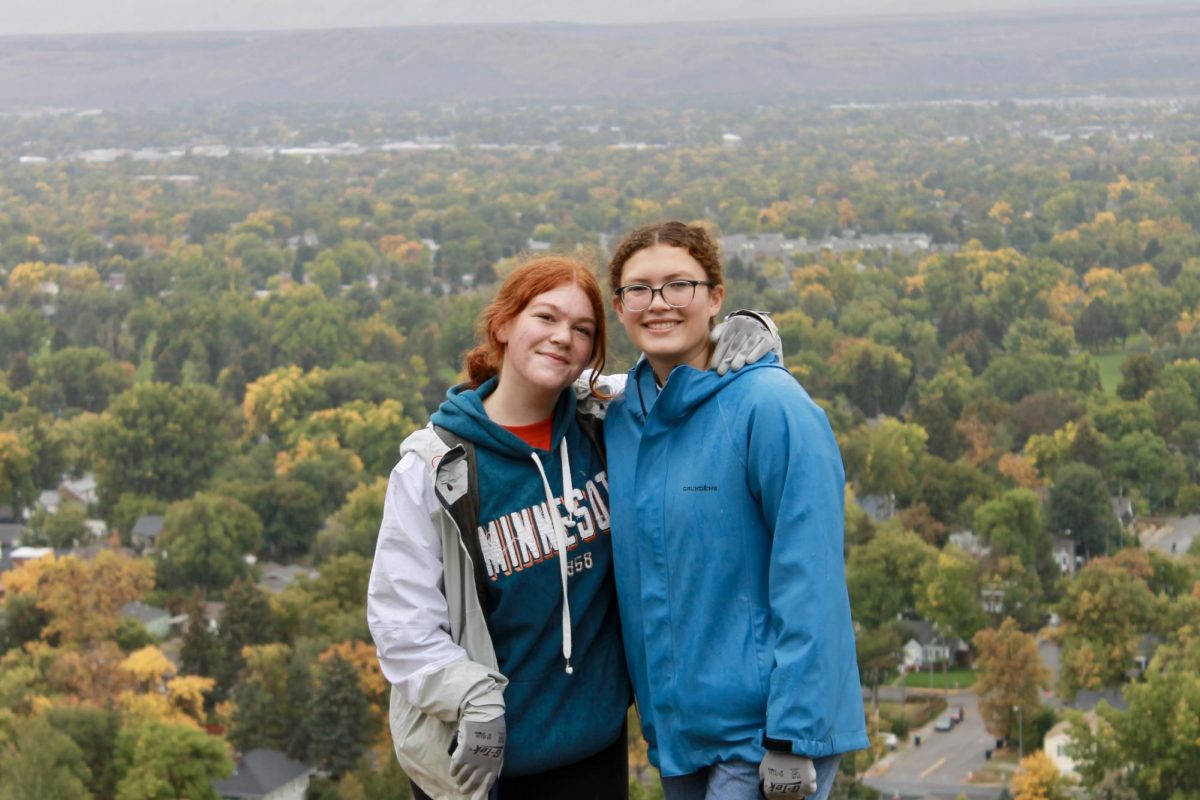 10.11.25 (From L - R) Sophmores Reata Limp and Harper Downing pose for a photo during Refresh the Rims.