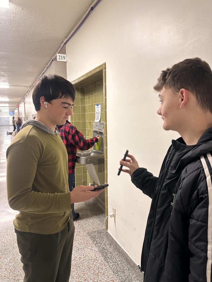 12.12.25
Sophomore Brody Larson showing his Spotify wrapped to sophomore Aiden McLain 