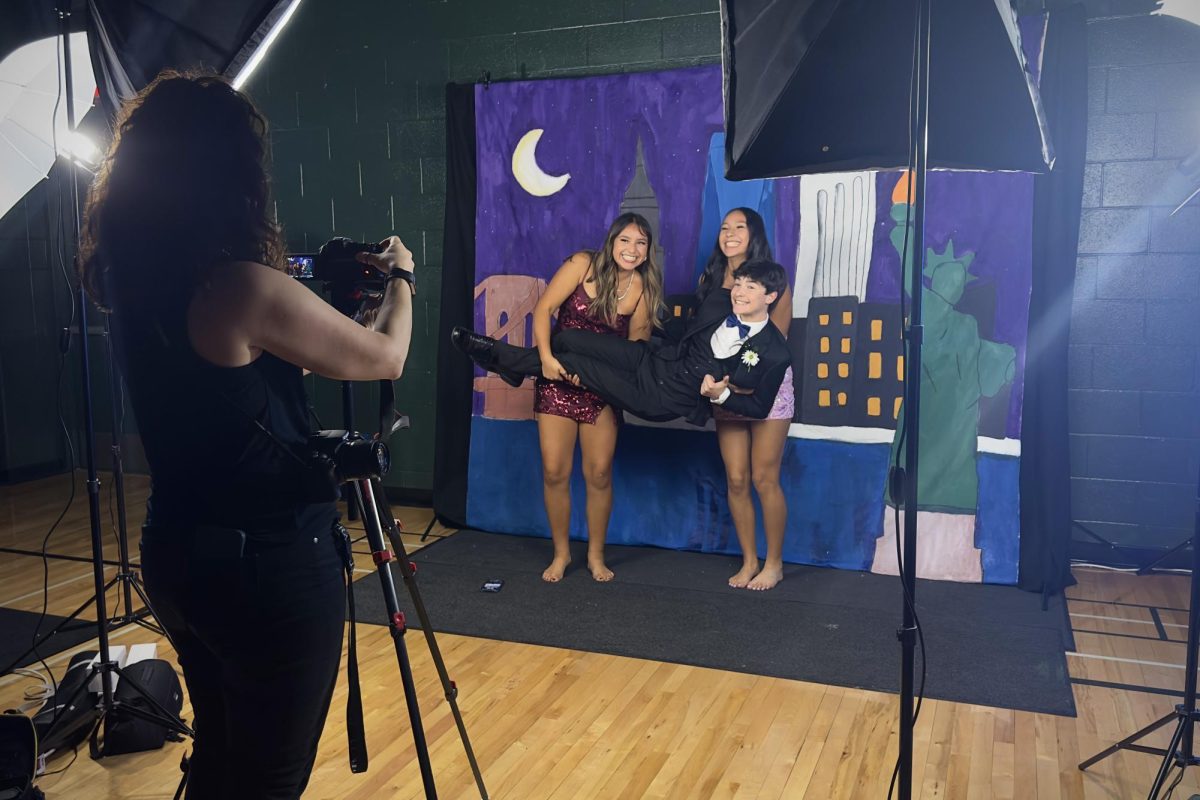 12.6.25 Teacher Kari Adam’s taking photos of Central students during twirp. 