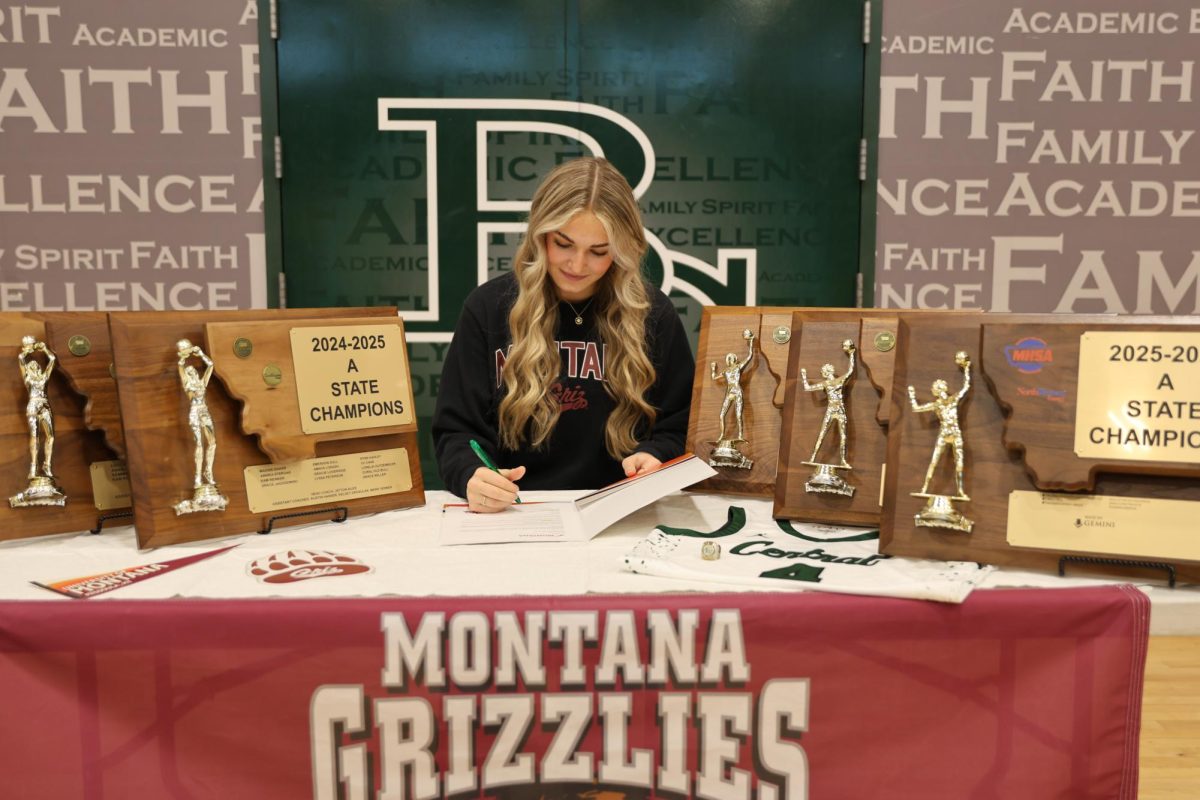 12.12.25 
Senior, Kamryn Reinker completing her signing to the University of Montana for basketball.