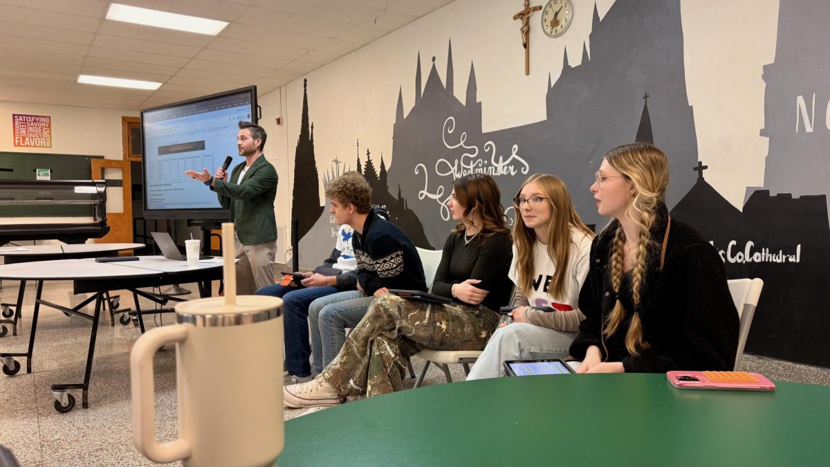 1.13.26
Mr. Fairbanks explaining the debate to Central students as the presidential candidates wait in anticipation. 