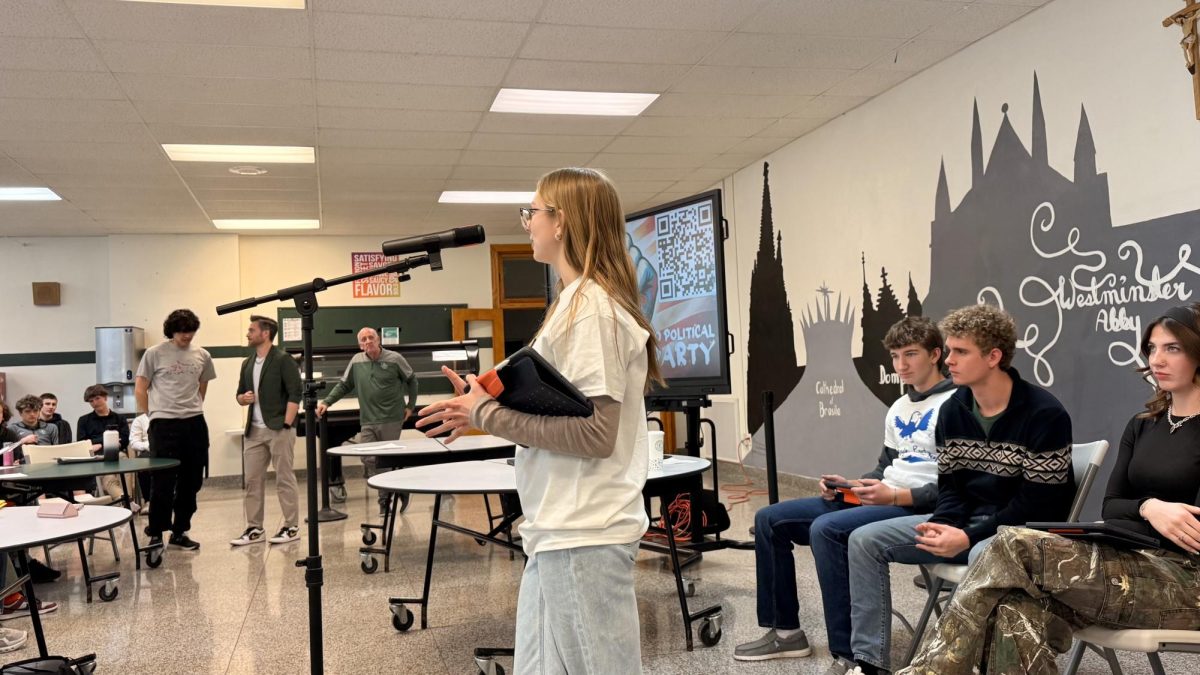 1.13.26 
Senior Brynn Sogaard explaining the goals of her party, “The Bridge Party.” 