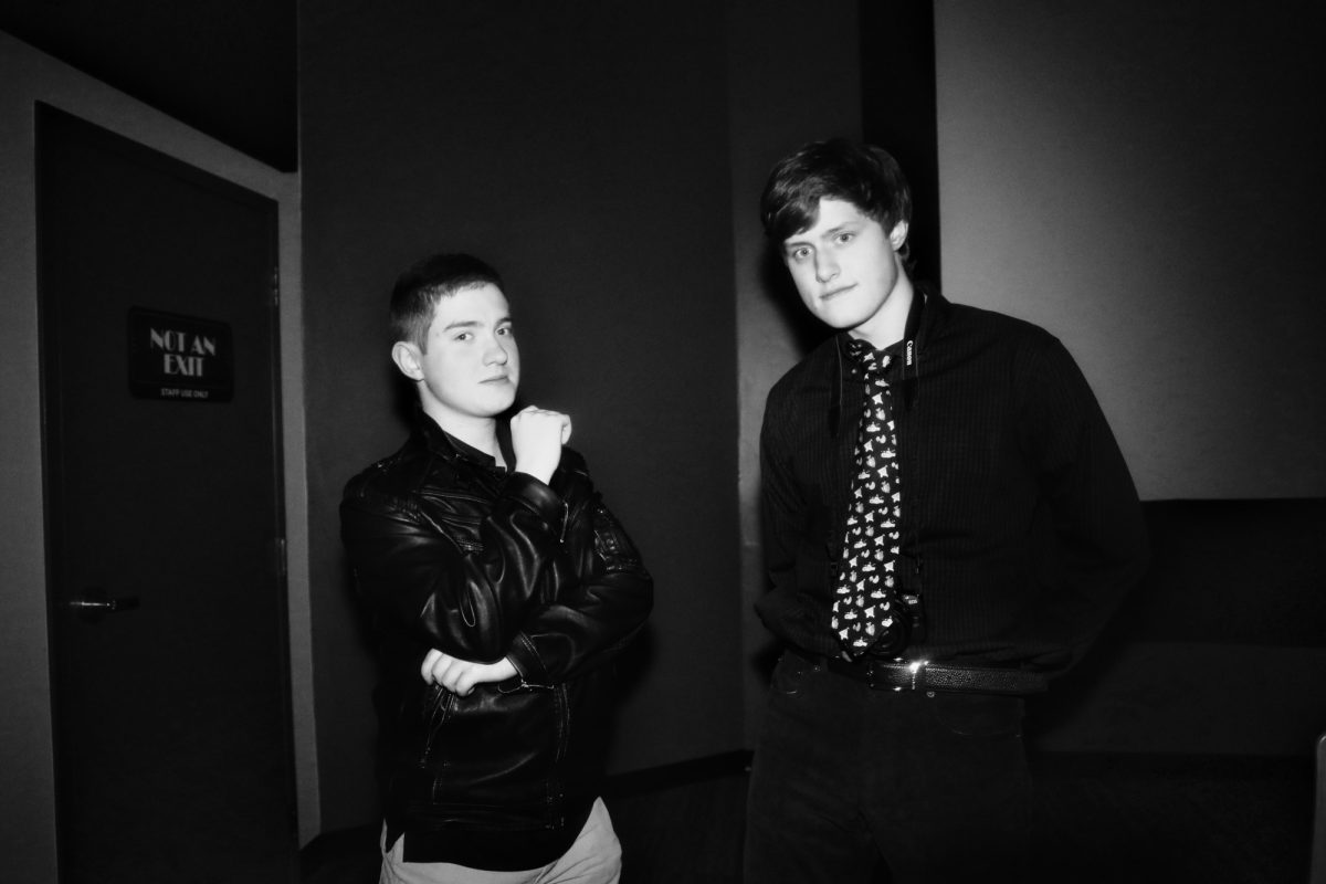 1.15.26 
(From L to R) Seniors Noah Duncil and Patryk Starosta posing for a fun photo as their characters Crispin and Gunter Mason. 