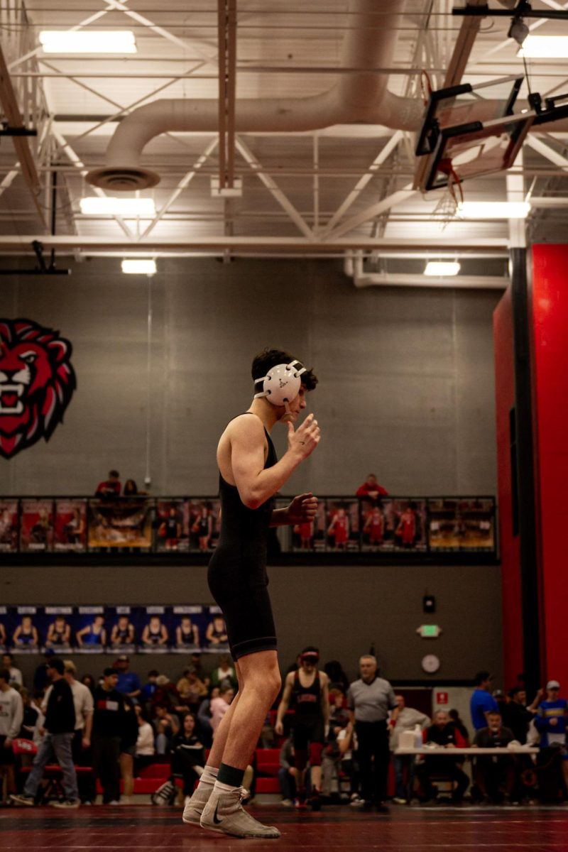 2.14.26
Sophmore, Kaius Rivera warming up before his quarterfinals match at the MHSA Eastern Class “A” Divisional Wrestling Tournament at Lockwood Highschool