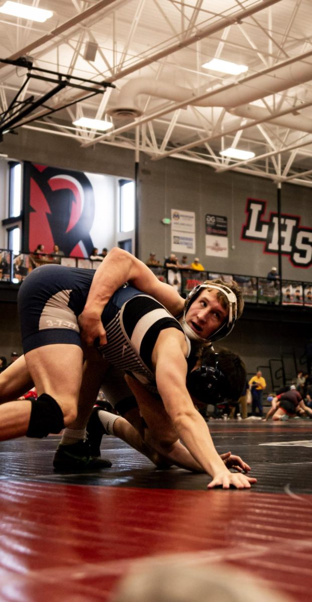 2.15.26
Freshman, Johnny Foster watching the clock run down as he rides his opponent out for the win in his consolation semifinal match at the MHSA Eastern Class “A” Divisional Wrestling Tournament at Lockwood Highschool