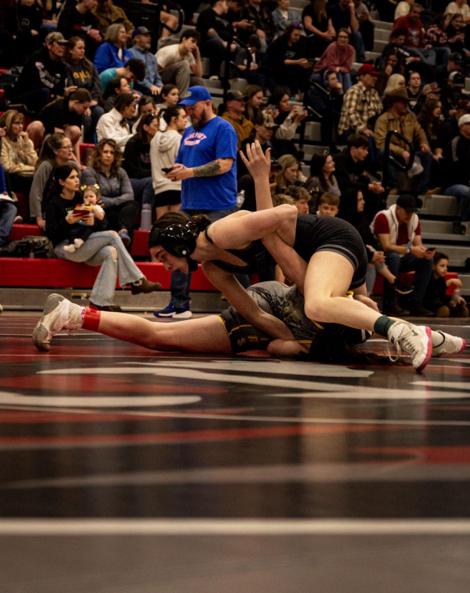 2.14.26
Sophmore, Emma Hernandez turning her opponent in an arm bar during the quarterfinal round of the MHSA Eastern Class “A” Girls Divisional Wrestling Tournament at Lockwood Highschool
