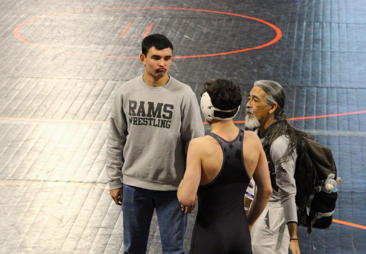 2.21.26
(L to R) Coach Jacob Morgan, Kaius Rivera, Coach Angelo Rivera during blood time of Kaius’ consolation quarterfinals match at the 2026 MHSA State Tournament