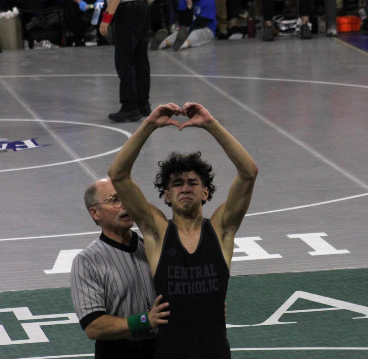 2.21.26
Aramis Rivera shows love to the Billings Central section after winning his final high school match