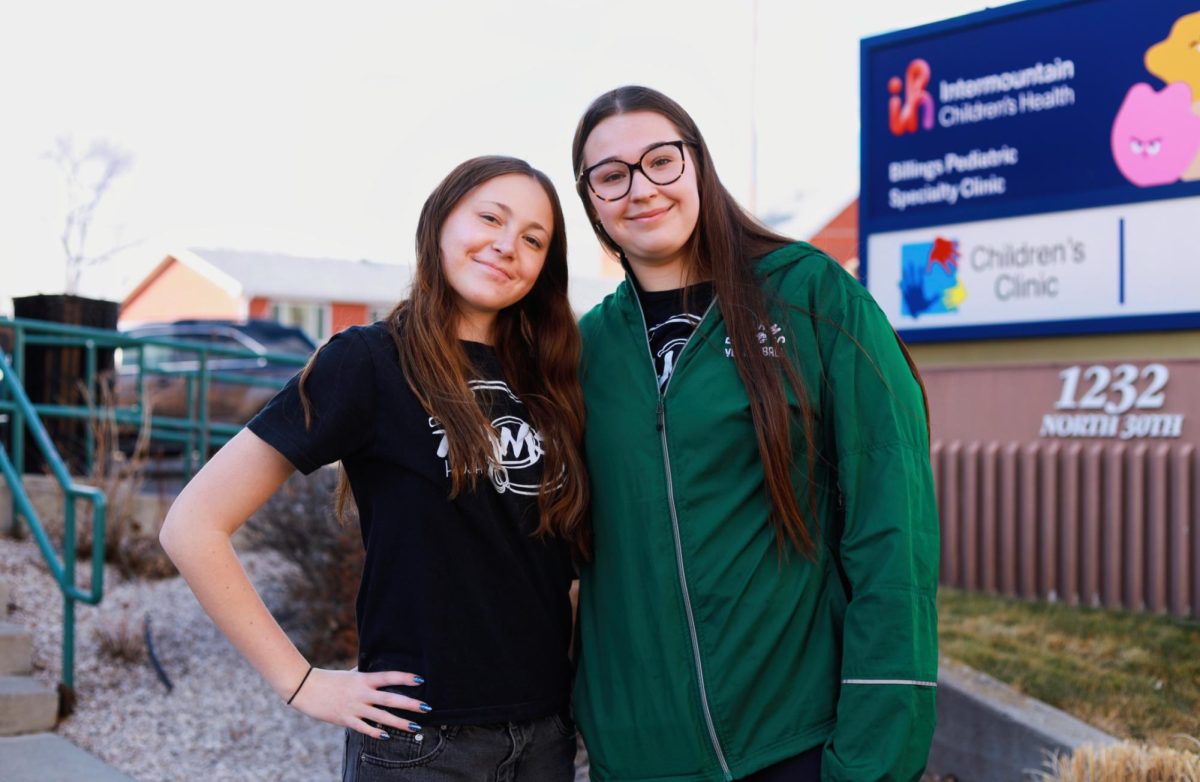 2.15.26
(From L to R)
Juniors, Bellamy Harada and Sami Ritchie posing for a photo at the Intermountain Health Children’s Clinic before walking to Billings Clinic to continue their artwork. 