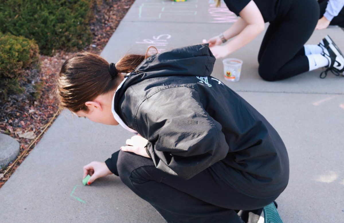 2.15.26
HOSA member beginning her drawing during Chalk the Walk.